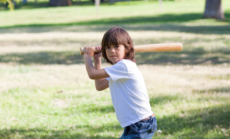 challenger-share-price-asx-cgf-asx-200-xjo-Portrait of adorable child playing baseball