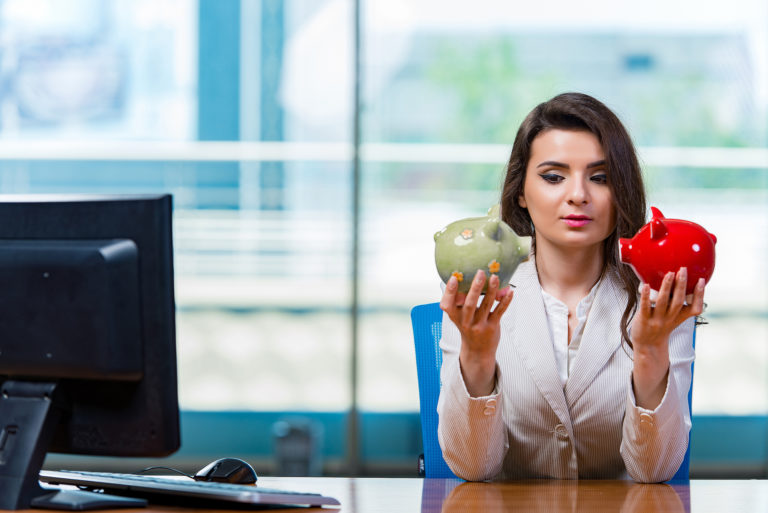 westpac-bank-wbc-share-price-pendal-group-pdl-pdl-share-asx-price-Businesswoman sitting at the office desk