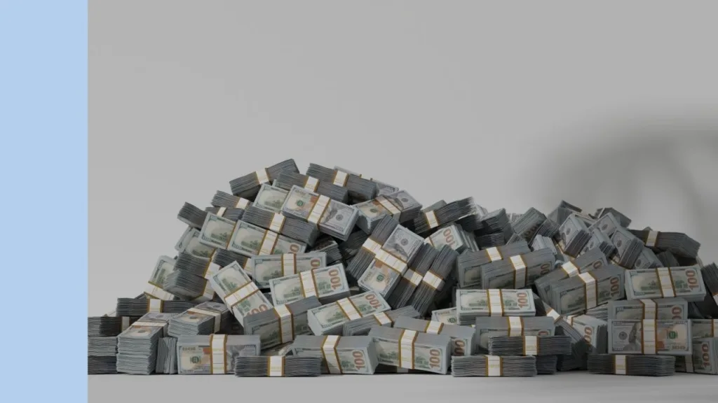 huge pile of US dollars in stacks of greenback notes