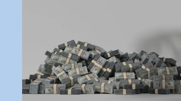 huge pile of US dollars in stacks of greenback notes