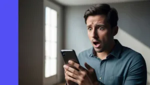 Man looks shocked reading news on his phone