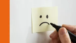 post it note shows a sad face