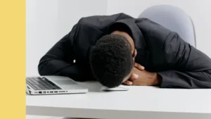 Man slumoed onto keyboard at desk