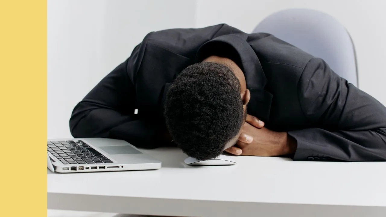 Man slumoed onto keyboard at desk