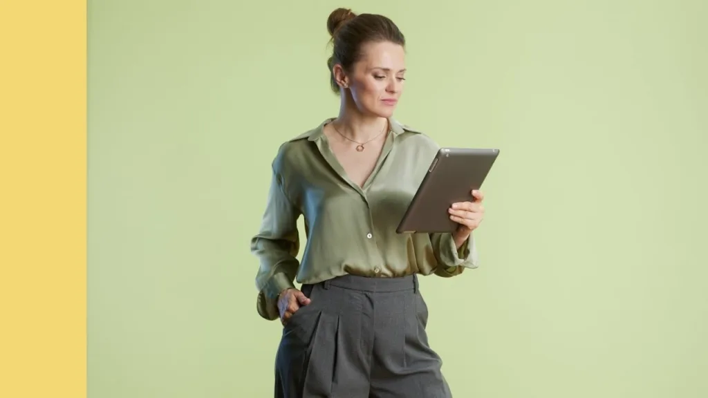 woman checking ipad in deep thought