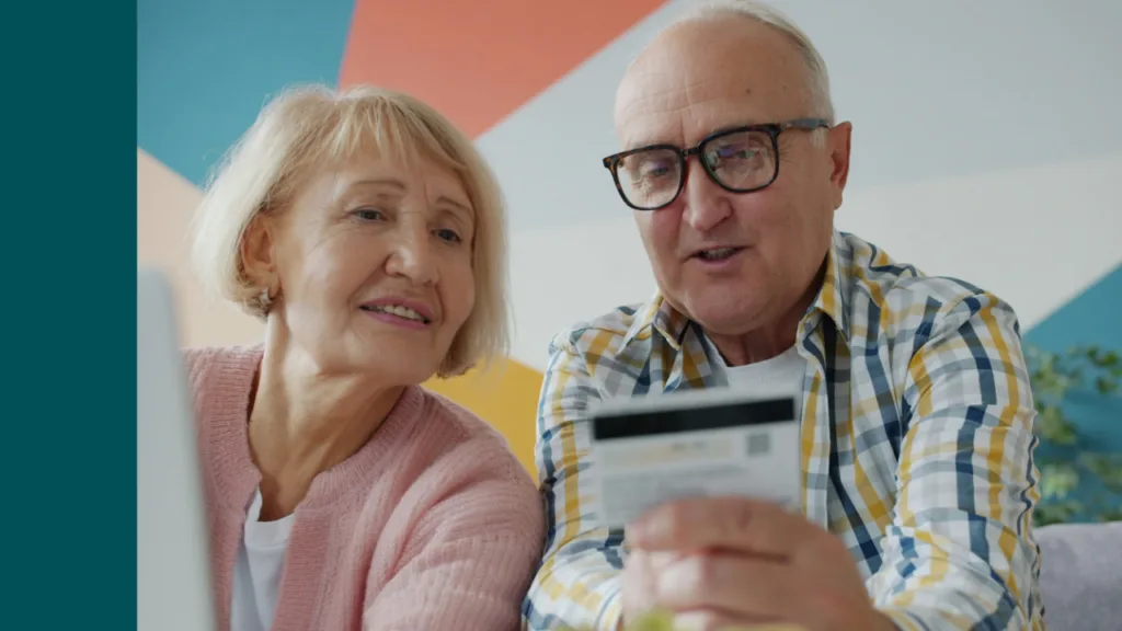 Older couple reviewing a paper document together